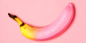 pink dip dyed banana on a pink background